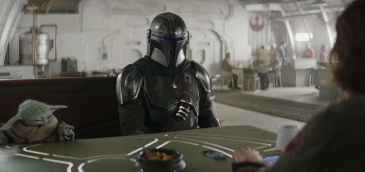 Escena de The Mandalorian y Grogu en la película de Star Wars dirigida por Jon Favreau.